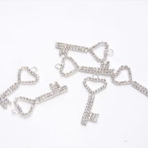 Key metal strass brooche pz.6